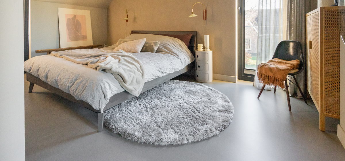 Wat voor vloerkleed onder mijn bed?